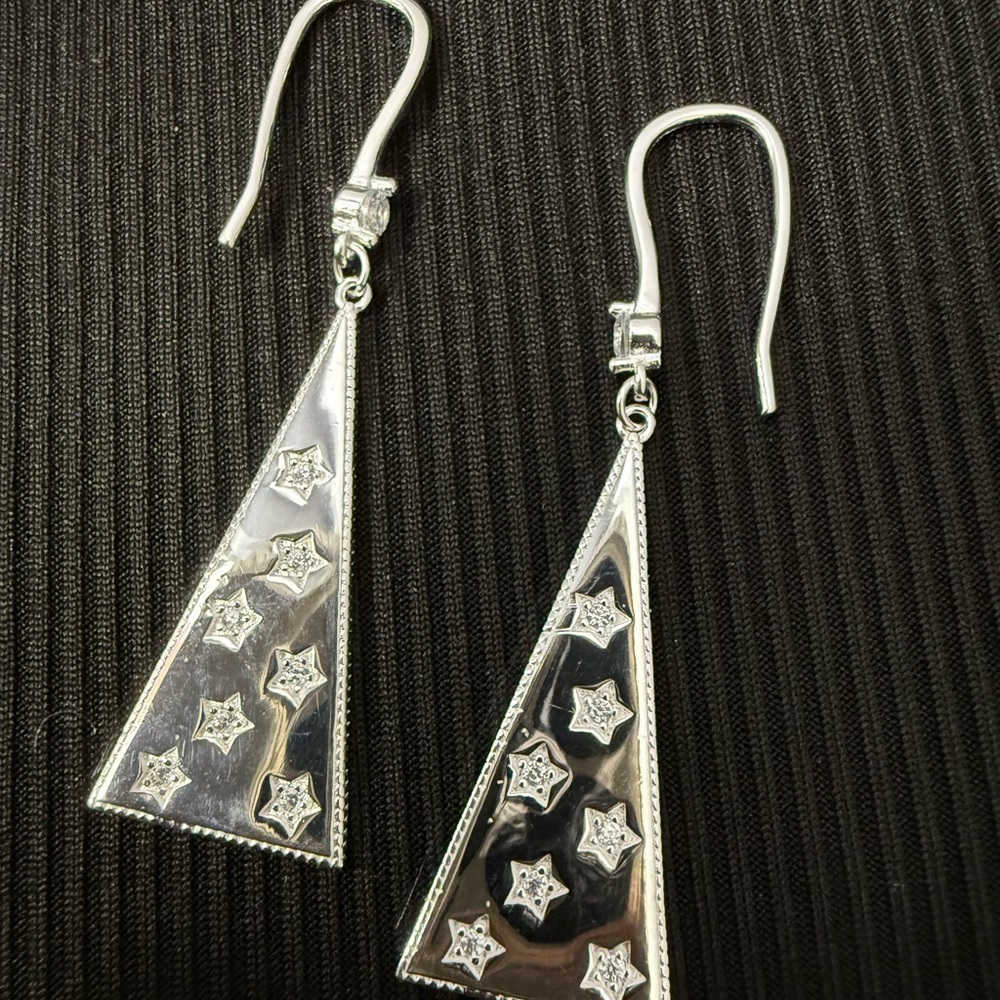 Earrings dangling